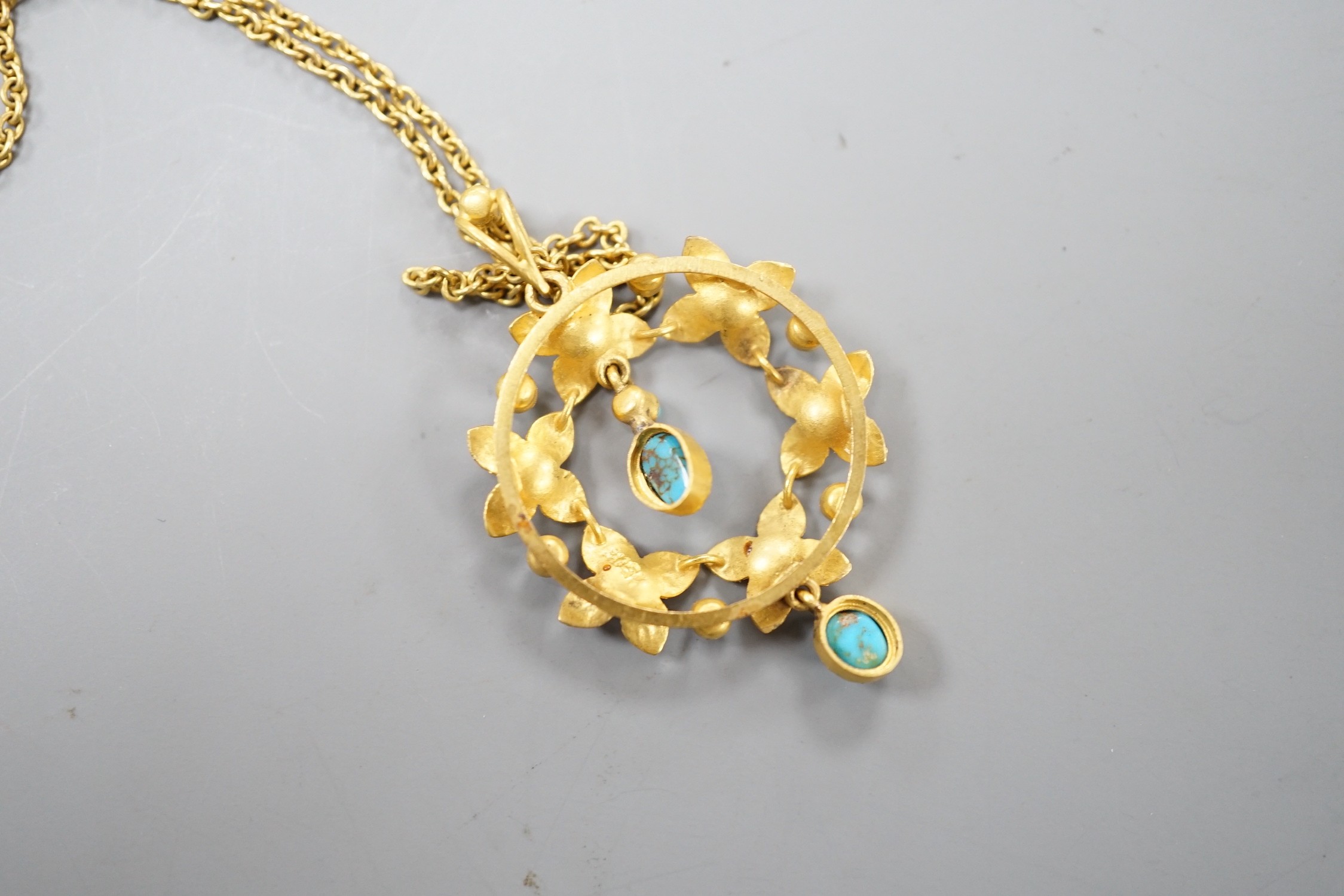 An Edwardian 15ctm turquoise and seed pearl set drop pendant necklace, pendant 35mm, chain 33cm, gross weight 4.9 grams.